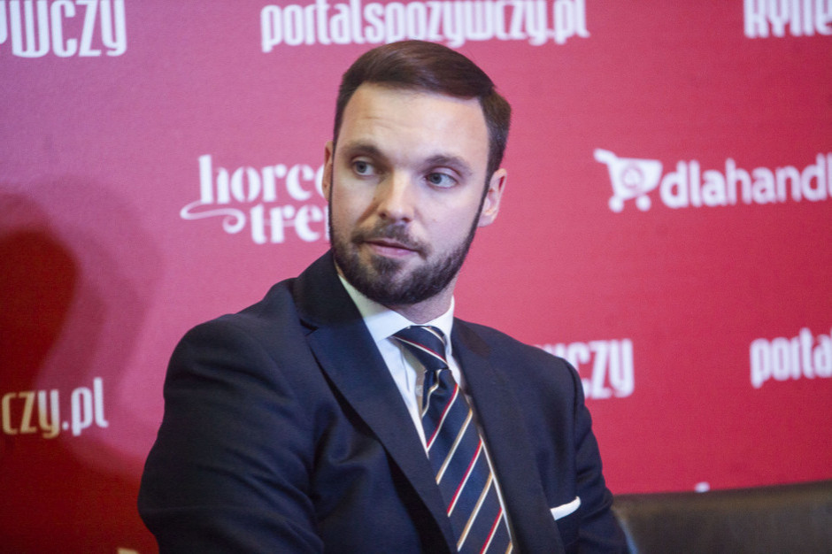 Łukasz Targoszyński, adwokat w warszawskim biurze kancelarii Baker McKenzie, fot. PTWP Ekspert: Na rynku FMCG dojdzie do kolejnych fuzji i przejęć